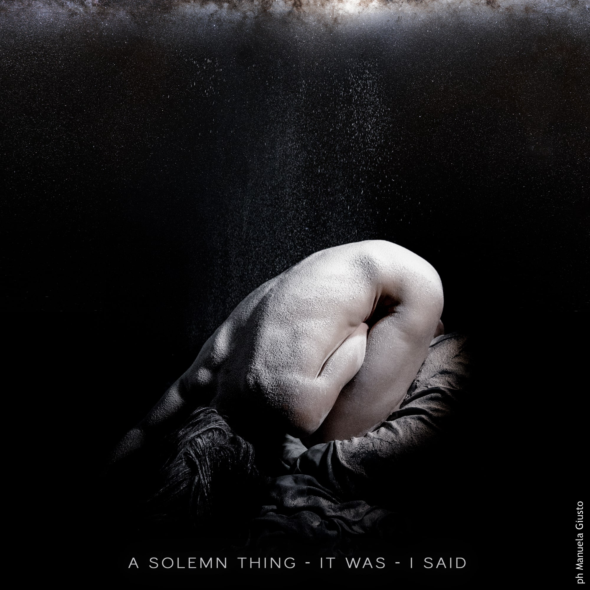 Album cover. It depicts a girl withdrawn into herself, with part of the universe at the top of the image.