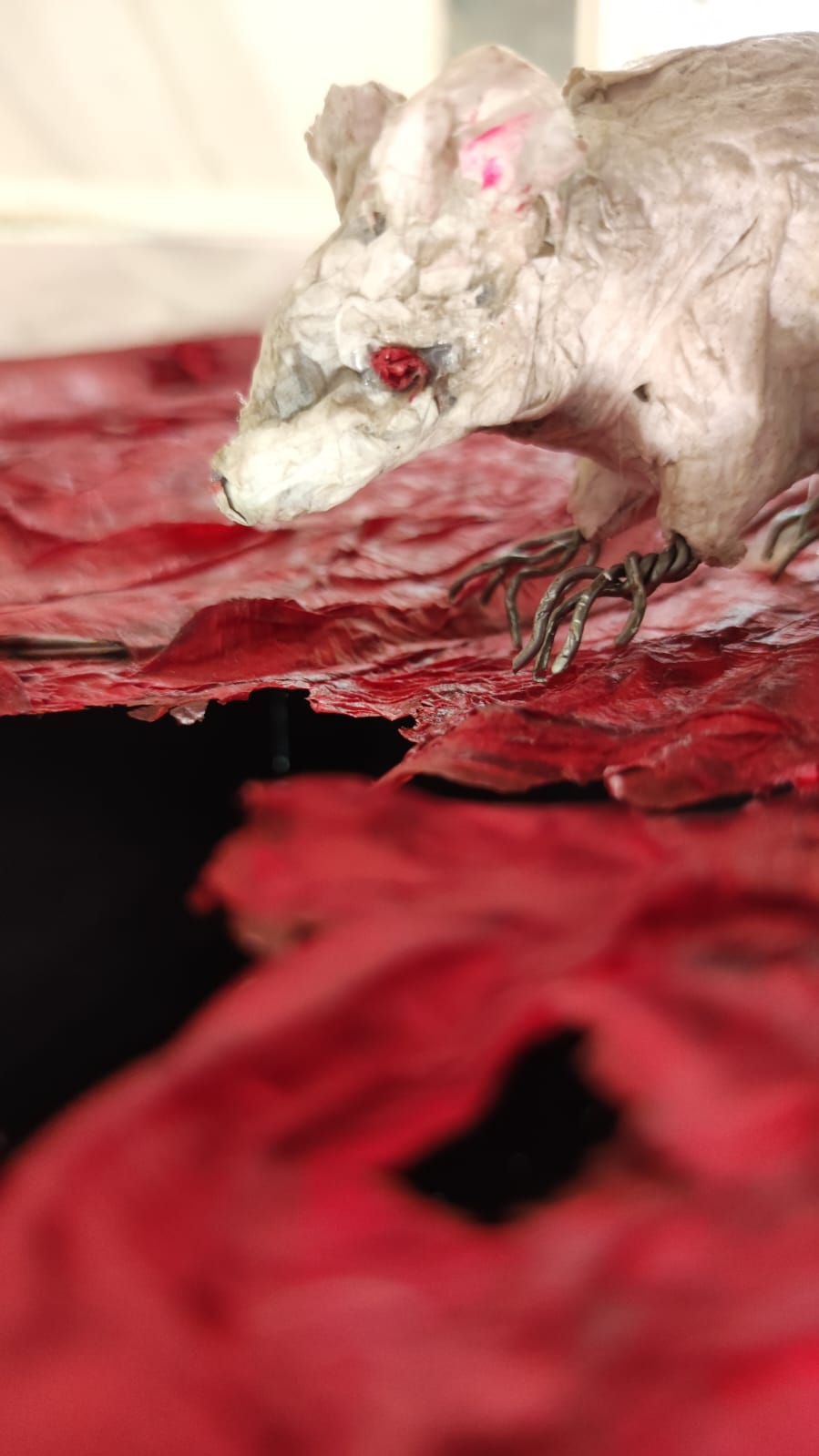 Detail of the mouse sculpture.